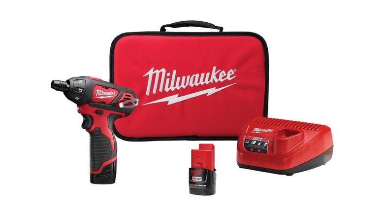 A Milwaukee electric screwdriver with a battery and charger along with a Milwaukee bag.