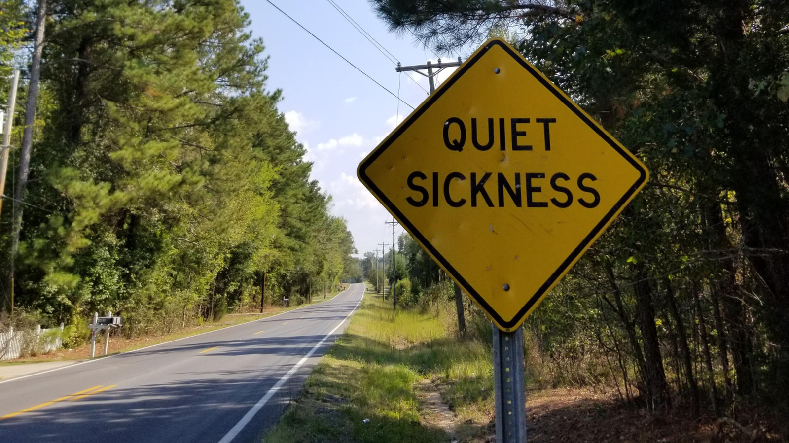 What Does A Road Sign That Says 'Quiet Sickness' Mean?