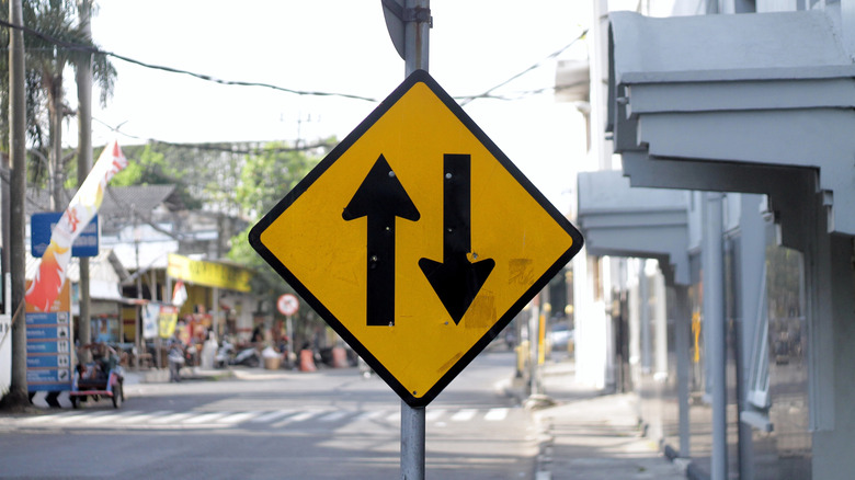 Two-way traffic sign on city street