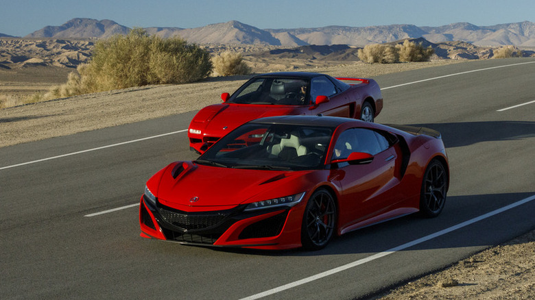 Original NSX and second-generation NSX driving side by side