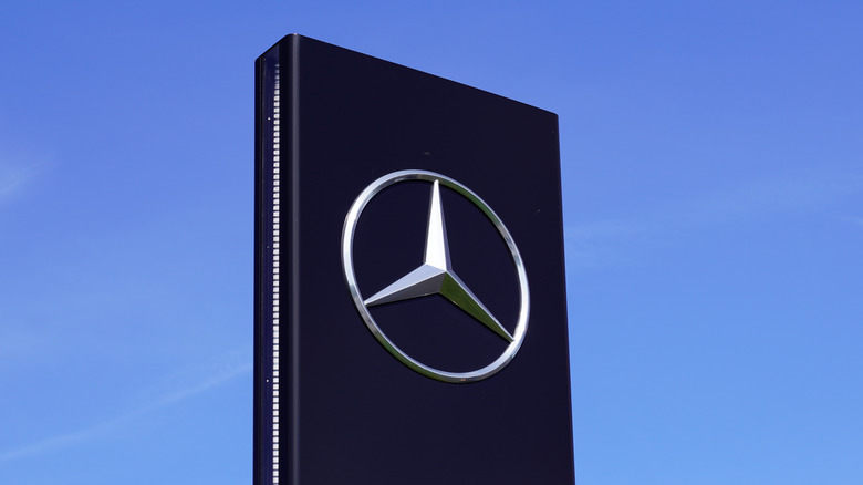 Mercedes logo on a sign