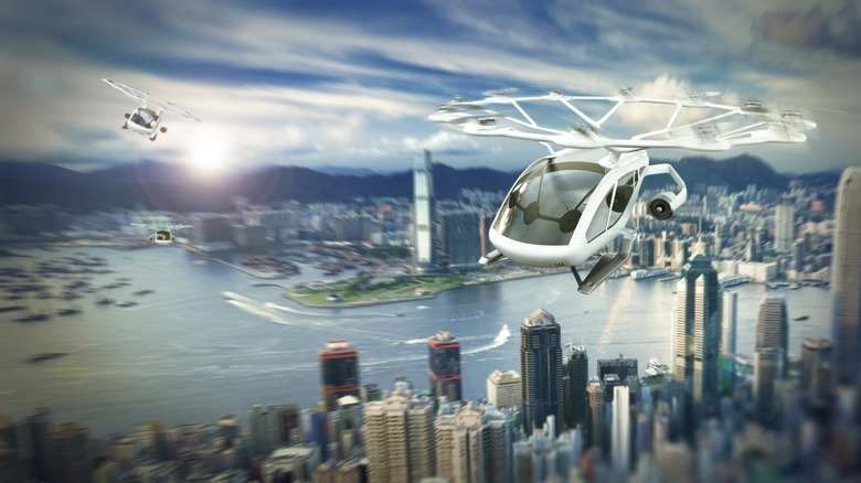 illustration of flying cars over city skyline