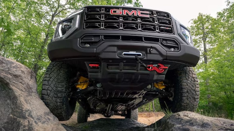 Black 2024 GMC Canyon AEV edition truck with winch