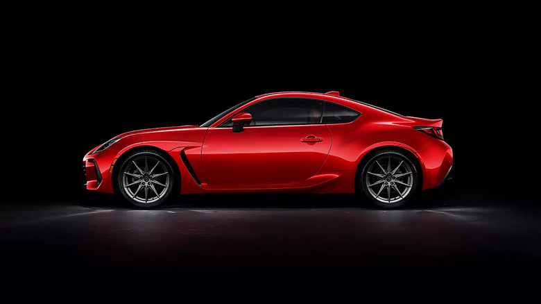 Red Subaru BRZ on black background