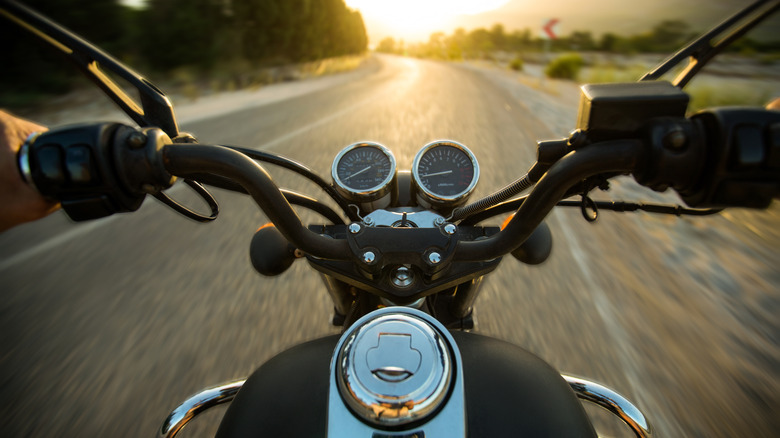 first-person view of driving a motorcycle