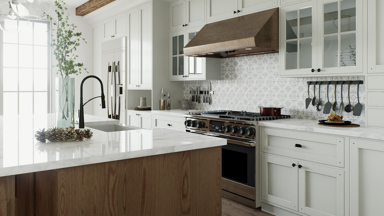 Fridge flush with countertops in modern kitchen