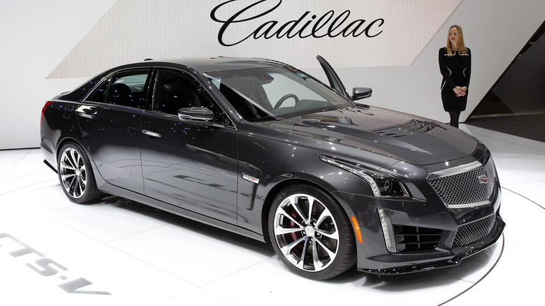 A gray Cadillac CTS-V on display at an auto show.