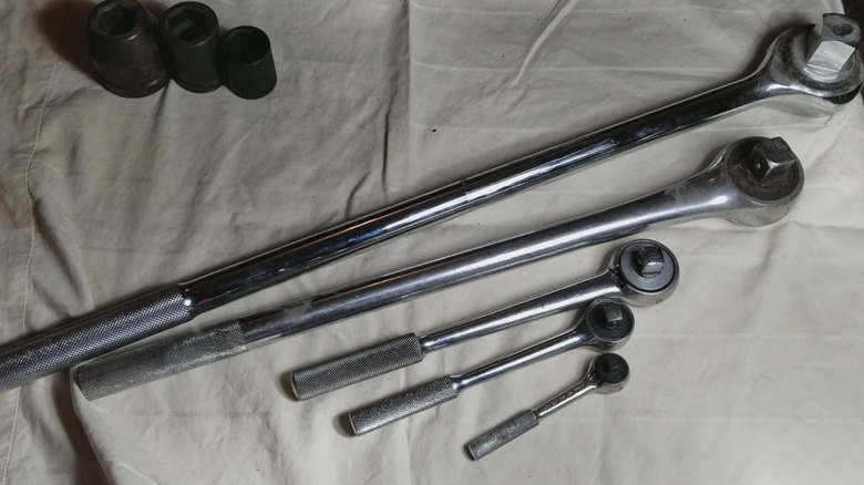 a selection of ratchet wrenches from 1/4-inch to 1-inch drive sizes