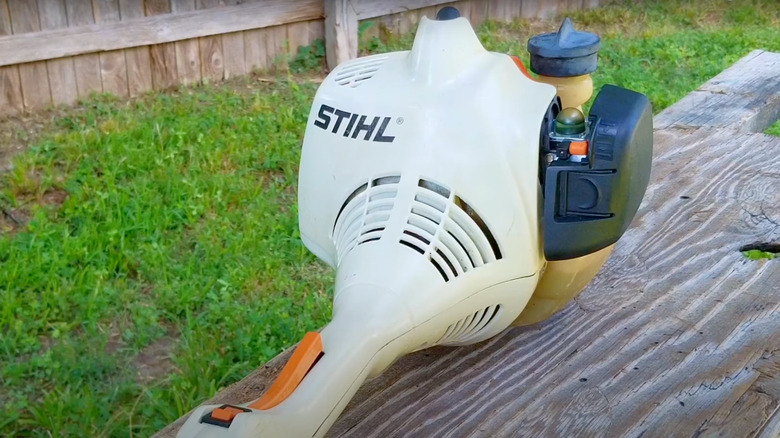 The rear side of a Stihl string trimmer