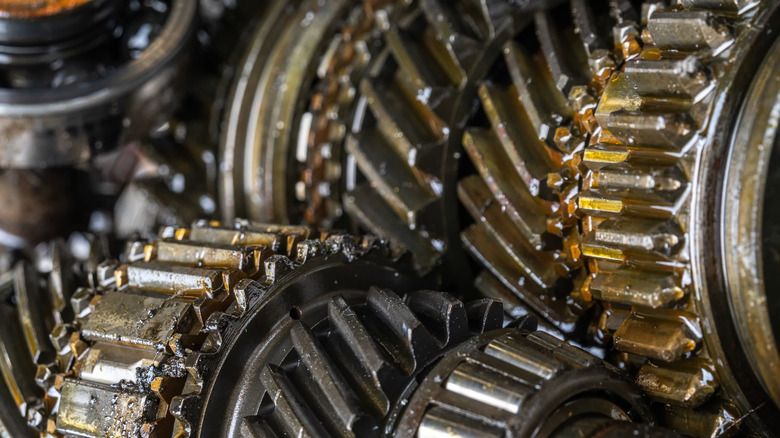 A close-up of a used transmission gearbox