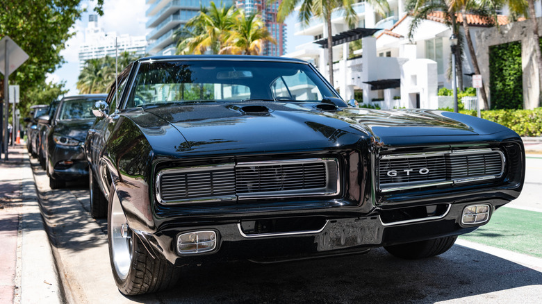Black 1968 Pontiac GTO parked on street