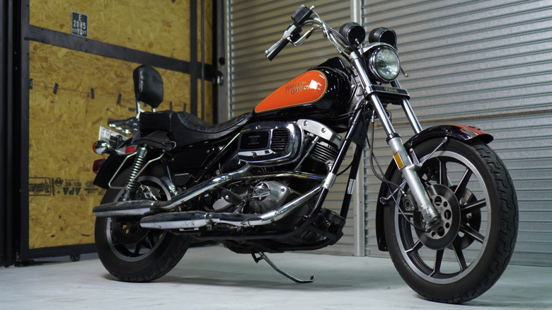 Harley-Davidson FXR bike on display, front right 3/4 view