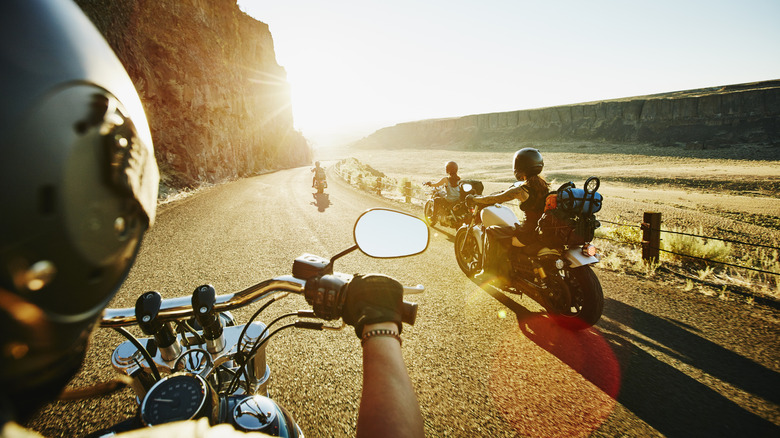 A group of friends riding their motorcycles