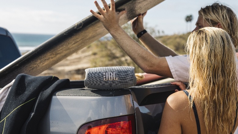 Surfers listnening to JBL Bluetooth speaker