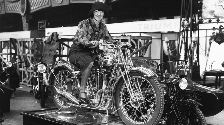 Woman sitting on BSA Motorcycle
