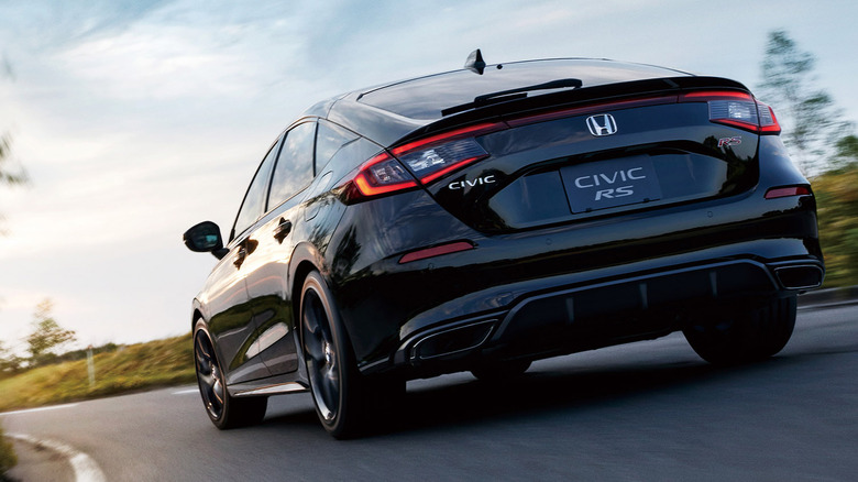 Rear view of 2024 Honda Civic RS on mountain road