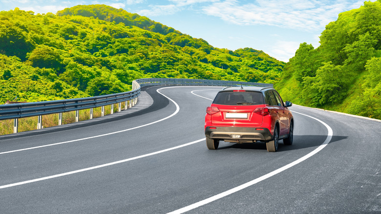Car driving through winding corners