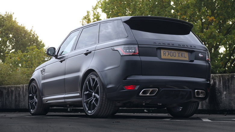 Rear view of a black 2023 Range Rover with the SVR logo