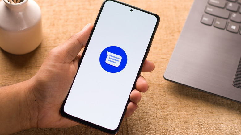 Google Messages logo on phone