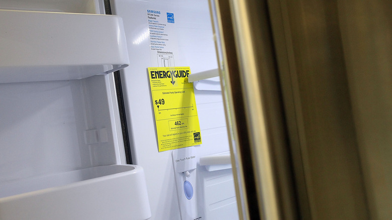 Inside of fridge with Energy Guide leaflet and Energy Star label