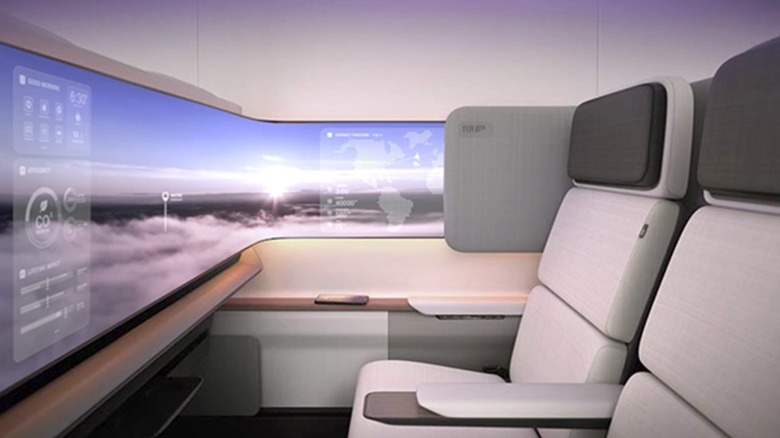 Inside of a commercial JetZero with seats and a screen