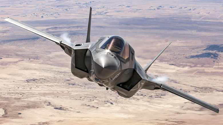 Front view of an F-35B fighter jet mid air