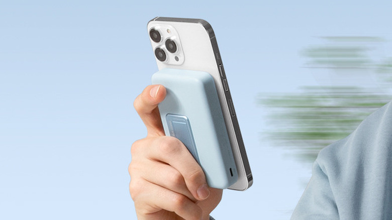 An Anker 633 Magnetic Battery on the back of a phone.