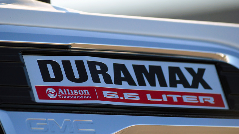 Close up view of Duramax emblem on GMC Sierra HD pickup truck.