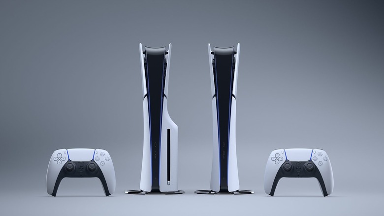 Sony PlayStation 5 consoles and controllers lined up next to each other