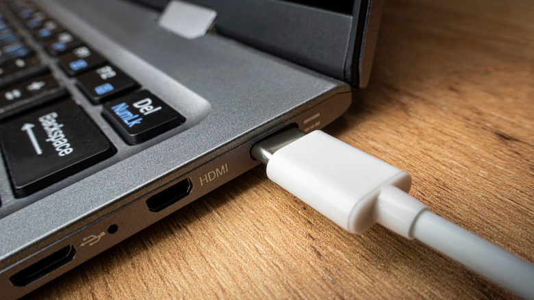 USB type C cable loosely connected to a laptop