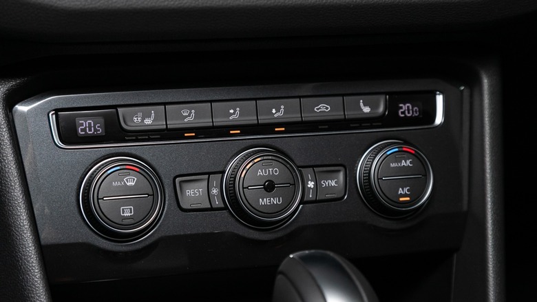 Volkswagen climate control console with a REST button