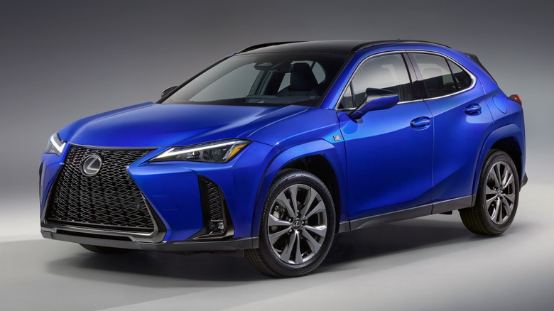 Blue 2025 Lexus UX 300h F Sport studio photo
