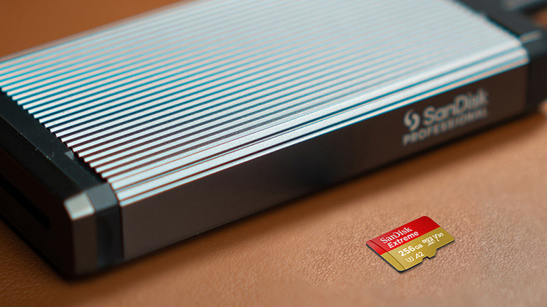 V30 SD card next to a hard drive