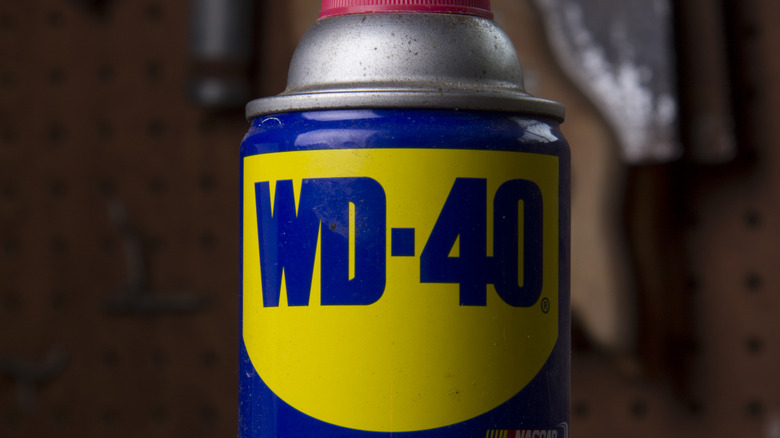 A can of WD-40 in a workshop.
