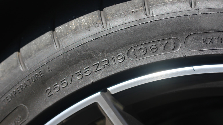 Close up of tire showing ZR and (Y) ratings
