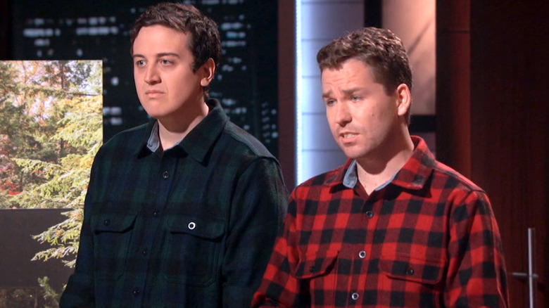 Getaway founders listening to Shark Tank panelists