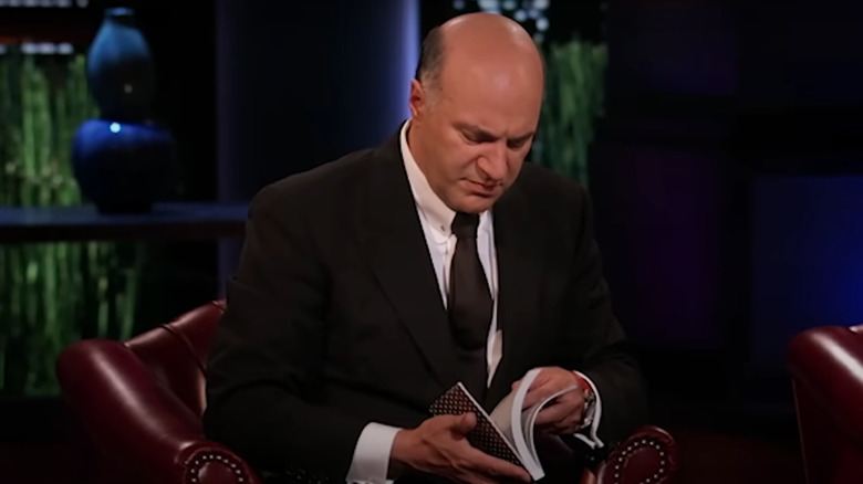 Kevin O'Leary looking at hi Groovebook in the Shark Tank episode that firt featured the product