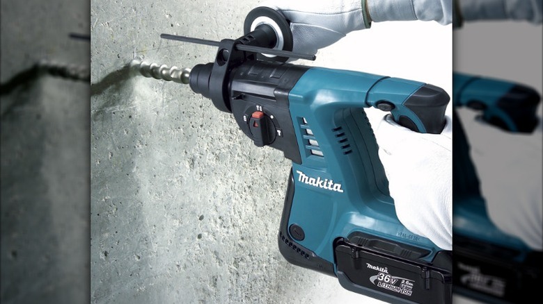 Person using 6V LXT Cordless 1" Rotary Hammer