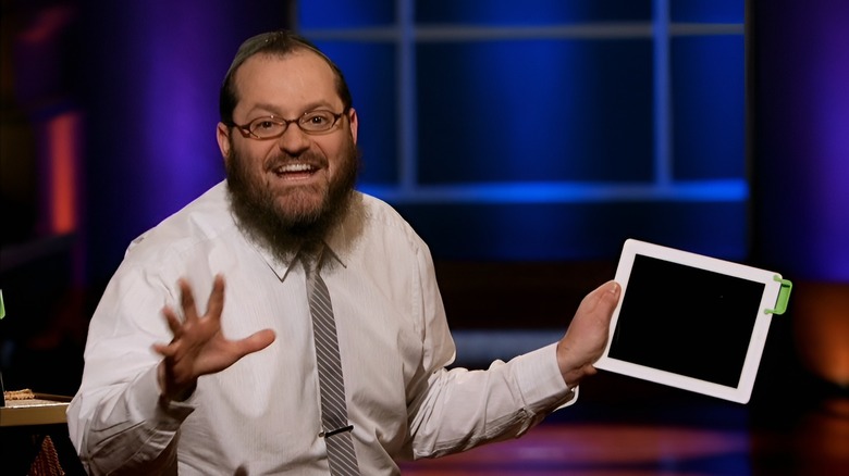 Moshe holding iPad with SoundBender while excitingly talking on Shark Tank