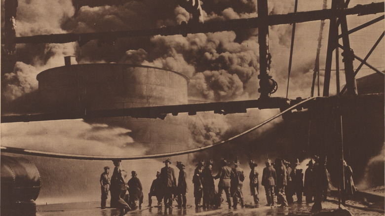 Firefighters spray water on a fire at Standard Oil's refinery in Brooklyn in 1919, an event that was labeled "The Greatest Fire New York Has Ever Known."