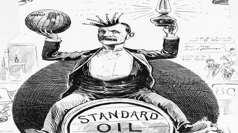 An editorial cartoon depicts John D. Rockefeller as the king of the world through his kerosene-oil empire