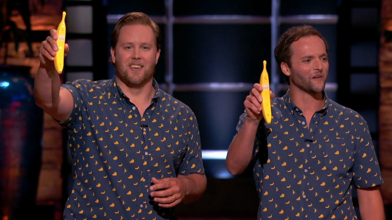 Two men hold Banana Phones