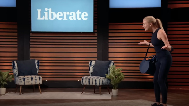 Liberate founder Olivia Bowser standing on the set of 'Shark Tank