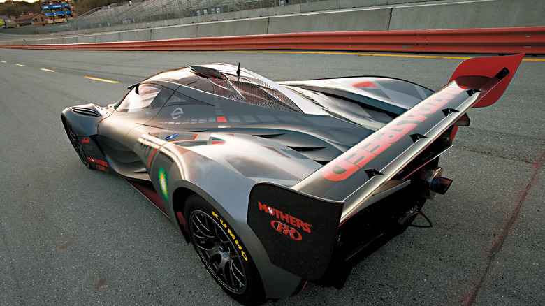 Mazda Furai parked on racetrack, rear-left view