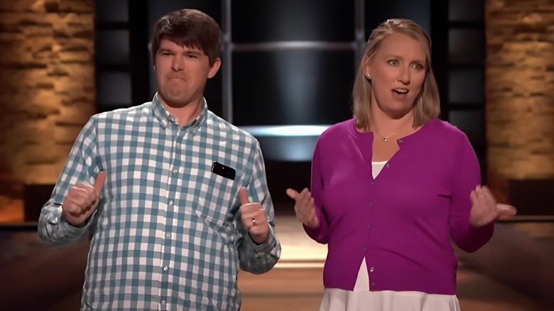 Matt and Melissa pointing at themselves on Shark Tank