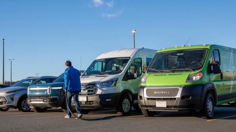 Man charging EV vehicles with SparkCharge