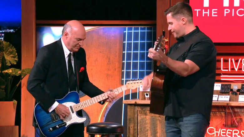 Kevin O'Leary playing guitar on Shark Tank