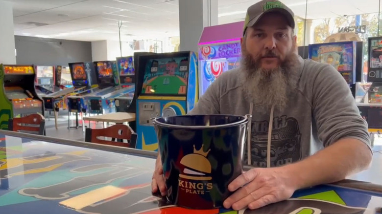 Brad Baker with the King's Plate donation bucket