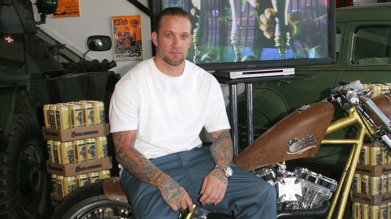 Jesse James sitting on chopper