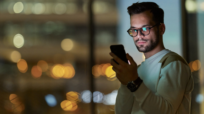 Person using smartphone.